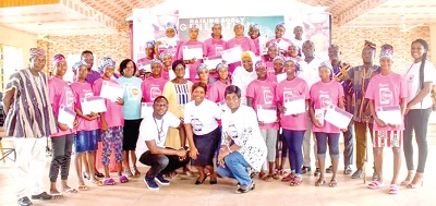 The trained ‘kayayei’ with some staff and management members of Opportunity International The trained ‘kayayei’ with some staff and management members of Opportunity International