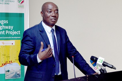 Dr Abass M. Awolu (left), Chief Director of the Ministry of Roads and Highway, adressing participants