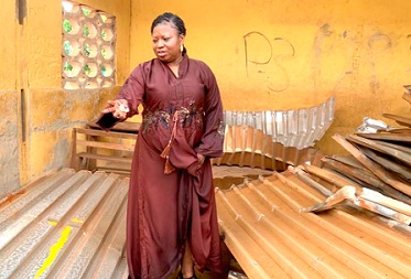 Akanvariba Lydia Lamisi, MP for Tempane, in one of the destroyed facilities Akanvariba Lydia Lamisi, MP for Tempane, in one of the destroyed facilities