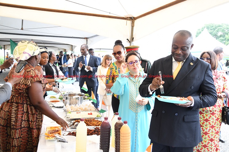 Thomas Mbomba (right), Deputy Minister of Foreign Affairs and Regional Integration, and  Wamkele Mene, Secretary-General of AfCFTA, interacting at the event. Picture: EBOW HANSON