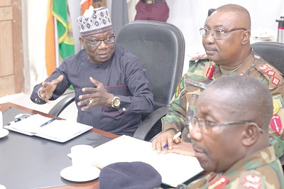 Ambassador Abdul-Fatau Musah (left), Leader of the ECOWAS delegation, interacting with Major General Michael Amoah-Ayisi (middle), Commander of MNJTF Ambassador Abdul-Fatau Musah (left), Leader of the ECOWAS delegation, interacting with Major General Michael Amoah-Ayisi (middle), Commander of MNJTF