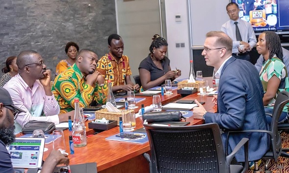 Trevor Kuna (right), Chief Transformation and Reputation Officer of QNET, interating with some journalists Trevor Kuna (right), Chief Transformation and Reputation Officer of QNET, interating with some journalists