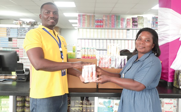 Collins Opoku (left), Branch Manager of Royal Dach Pharmaceuticals, presenting the items to Mavis Asiama, Corporate Communications Officer, GCGL. INSET: Some of the drugs. Picture: EDNA SALVO-KOTEY Collins Opoku (left), Branch Manager of Royal Dach Pharmaceuticals, presenting the items to Mavis Asiama, Corporate Communications Officer, GCGL. INSET: Some of the drugs. Picture: EDNA SALVO-KOTEY
