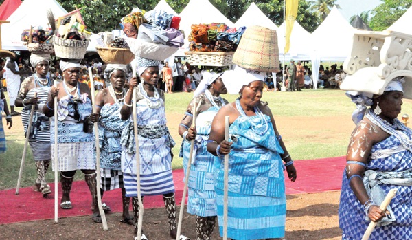 A group of women re-enacting the migration of the Anlos from Notsie