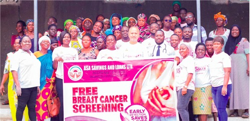 Mohammed Aourongjeb (5th from right), MD, ASA Savings and Loans; Dr Edwin Essel (4th from right), Medical Practitioner, Korle Bu Teaching Hospital; some workers of the ASA Savings and Loans and market women who were examined at the screening exercise at Accra New Town Mohammed Aourongjeb (5th from right), MD, ASA Savings and Loans; Dr Edwin Essel (4th from right), Medical Practitioner, Korle Bu Teaching Hospital; some workers of the ASA Savings and Loans and market women who were examined at the screening exercise at Accra New Town