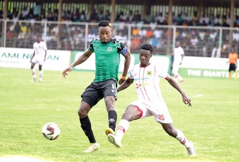 FC Samrtex lon-goal hero, Emmanuel Keyeke (left) gains the upper hand during a tussle with Andrews Ntim Manu of Kotoko in last Saturday's clash FC Samrtex lon-goal hero, Emmanuel Keyeke (left) gains the upper hand during a tussle with Andrews Ntim Manu of Kotoko in last Saturday's clash