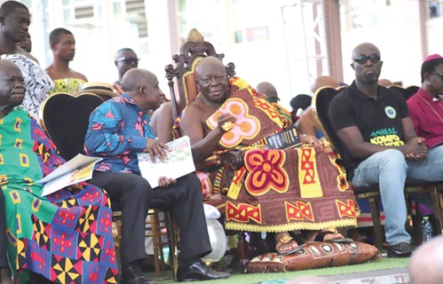 Otumfuo Osei Tutu II (middle), the Asantehene, in a chat with Simon Osei-Mensah (2nd from left), the Ashanti Regional Minister, at the fundraising launch Otumfuo Osei Tutu II (middle), the Asantehene, in a chat with Simon Osei-Mensah (2nd from left), the Ashanti Regional Minister, at the fundraising launch