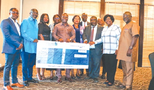 From left to right: Alfred Opoku Agyepong-Financial Controller, Labadi Beach Hotel, Professor Douglas Boateng, Board Chairman, Yvonne Prempeh-SSNIT, Pearl Darko-Board Member, David Eduaful-Managing Director-Labadi Beach Hotel, Rosemary Yeboah-Board Member, Kingsley Okoe Ofosu Obeng-SSNIT, Joseph Appau Boateng-SSNIT, Ahmed Abdul-Rahim-Board Member, Juliana Addo-Yobo-Board Member, Addae Antwi-Boasiako-Board Member, displaying the dummy cheque for the dividend after the presentation From left to right: Alfred Opoku Agyepong-Financial Controller, Labadi Beach Hotel, Professor Douglas Boateng, Board Chairman, Yvonne Prempeh-SSNIT, Pearl Darko-Board Member, David Eduaful-Managing Director-Labadi Beach Hotel, Rosemary Yeboah-Board Member, Kingsley Okoe Ofosu Obeng-SSNIT, Joseph Appau Boateng-SSNIT, Ahmed Abdul-Rahim-Board Member, Juliana Addo-Yobo-Board Member, Addae Antwi-Boasiako-Board Member, displaying the dummy cheque for the dividend after the presentation