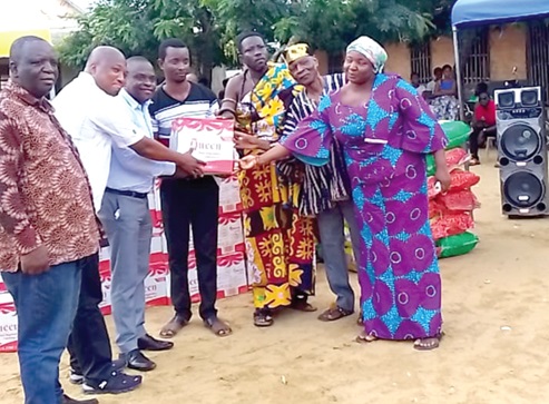 Kobina Dickson (3rd from left), Relationship Manager, VN Commodities, presenting the items to Samuel Okudzeto Ablakwa (2nd from left), MP, North Tongu, and other opinion leaders in the area Kobina Dickson (3rd from left), Relationship Manager, VN Commodities, presenting the items to Samuel Okudzeto Ablakwa (2nd from left), MP, North Tongu, and other opinion leaders in the area