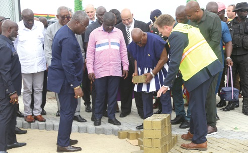 President Akufo-Addo (bent) laying a brick for the next stage of the expansion project at the MPS,Tema. With them is Kwaku Ofori Asiamah (4th from left), Minister of Transport, and Mohamed Samara (3rd from right), CEO, MPS. Picture: SAMUEL TEI ADANO President Akufo-Addo (bent) laying a brick for the next stage of the expansion project at the MPS,Tema. With them is Kwaku Ofori Asiamah (4th from left), Minister of Transport, and Mohamed Samara (3rd from right), CEO, MPS. Picture: SAMUEL TEI ADANO
