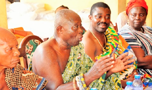Togbe Kwaku Ayim IV (2nd from right), Paramount Chief of Ziavi, interacting with some elders at the palace during the presentation of the relief items Togbe Kwaku Ayim IV (2nd from right), Paramount Chief of Ziavi, interacting with some elders at the palace during the presentation of the relief items