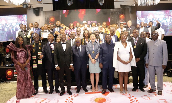 President Akufo-Addo (middle) with the executive of the Ghana Energy Awards Committee and winners of the awards. Picture: SAMUEL TEI ADANO
