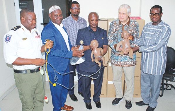 Prof. Anthony Kovac (2nd from right) of the University of Kansas Medical Centre; Prof. Ahmed N. Zakariah (middle), CEO, National Ambulance Service, and other officials holding some of the equipment Prof. Anthony Kovac (2nd from right) of the University of Kansas Medical Centre; Prof. Ahmed N. Zakariah (middle), CEO, National Ambulance Service, and other officials holding some of the equipment
