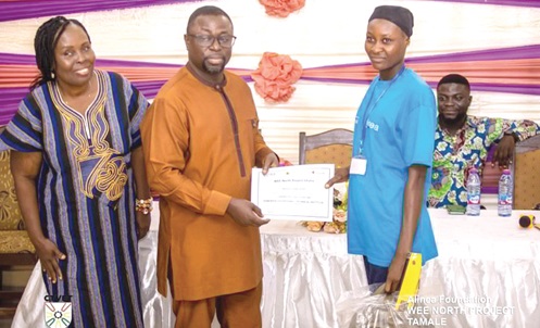 Dr Fred Kyei Asamoah, Director-General of CTVET, presenting a certificate to one of the trainees at Dabokpa Technical Institute under the project Dr Fred Kyei Asamoah, Director-General of CTVET, presenting a certificate to one of the trainees at Dabokpa Technical Institute under the project