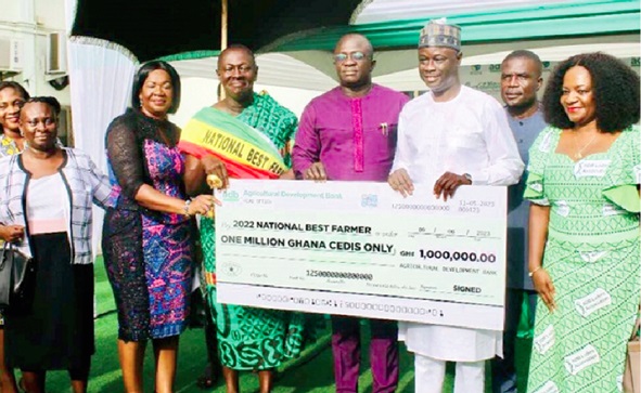 ADB Bank has always been the headline sponsor of the National Farmers Day. FLASHBACK: Nana Yaw Sarpong Siriboe (3rd from left), 2022 National Best Farmer, Dr Bryan Acheampong (4th from left), Minister of Food and Agriculture, and Alhaji Alhassan Yakubu-Tali (right), Managing Director of ADB, pose with the dummy cheque for the first prize ADB Bank has always been the headline sponsor of the National Farmers Day. FLASHBACK: Nana Yaw Sarpong Siriboe (3rd from left), 2022 National Best Farmer, Dr Bryan Acheampong (4th from left), Minister of Food and Agriculture, and Alhaji Alhassan Yakubu-Tali (right), Managing Director of ADB, pose with the dummy cheque for the first prize