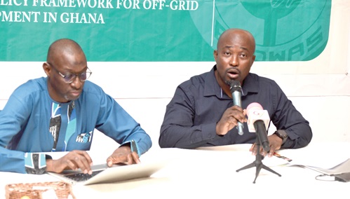 Seth A. Mahu (right), Deputy Director, Power, in charge of Renewable Energy, addressing the participants. With him is El Hadji Sylla, Senior Advisor, ECOWAS Commission