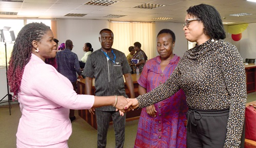 Kathleen Addy (left), NCCE Chairperson, welcoming Ecoma Alaga, a Senior Political Affairs Officer, UN Department of Political and Peace Building Affairs, Western Africa Division, to her office Kathleen Addy (left), NCCE Chairperson, welcoming Ecoma Alaga, a Senior Political Affairs Officer, UN Department of Political and Peace Building Affairs, Western Africa Division, to her office