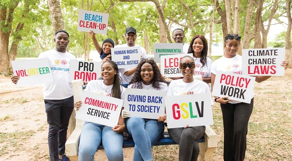 Some Ghana School of Law volunteers bearing placards Some Ghana School of Law volunteers bearing placards