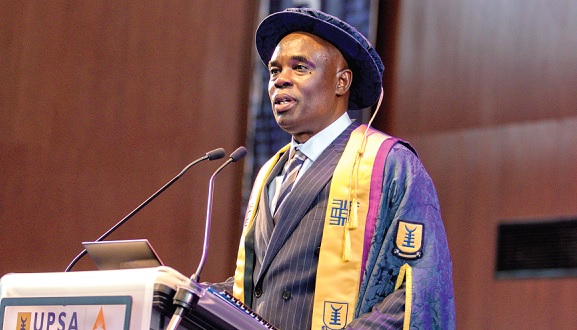 Professor Abednego Feehi Okoe Amartey (inset), Vice-Chancellor of UPSA, addressing a session of the graduates Professor Abednego Feehi Okoe Amartey (inset), Vice-Chancellor of UPSA, addressing a session of the graduates
