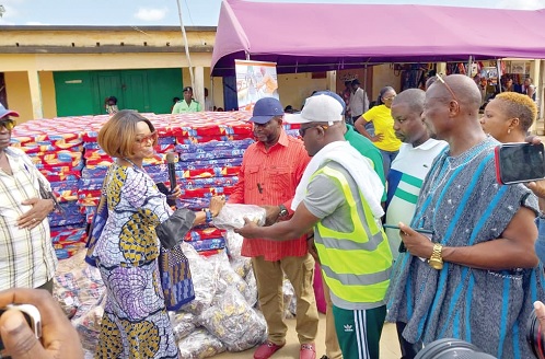 Delphine Dogbega (left), board member of Ghana Gas, making the presentation to Eric Nana Agyemang Prempeh (2nd from left), NADMO Director-General, at the Aveyime distribution centre Delphine Dogbega (left), board member of Ghana Gas, making the presentation to Eric Nana Agyemang Prempeh (2nd from left), NADMO Director-General, at the Aveyime distribution centre