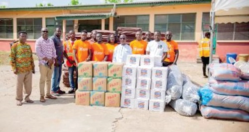 Staff of Fidelity Bank and officials of NADMO after the presentation Staff of Fidelity Bank and officials of NADMO after the presentation