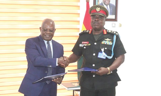 Major General Richard Addo Gyane (right), Commandant, KAIPTC, and Vice Admiral Ibok-Ete Ekwe Ibas (retd), the Nigeria High Commissioner in Ghana, exchanging the signed document Major General Richard Addo Gyane (right), Commandant, KAIPTC, and Vice Admiral Ibok-Ete Ekwe Ibas (retd), the Nigeria High Commissioner in Ghana, exchanging the signed document