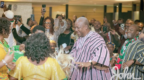 Former President John Mahama (arrowed) being cheered by some members of the Canada Chapter of NDC during the visit