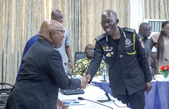 Mike Aaron Oquaye (left), Chairman, NPP Presidential Elections Committee, in a handshake with Dr George Akuffo Dampare, Inspector General of Ghana Police, during the meeting Mike Aaron Oquaye (left), Chairman, NPP Presidential Elections Committee, in a handshake with Dr George Akuffo Dampare, Inspector General of Ghana Police, during the meeting