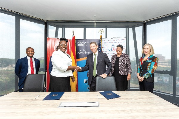 Grace Anim-Yeboah (2nd from left), Business Banking Director, Absa Bank, exchanging the document with Scott Nathan, CEO of US International DFC. With them is Virginia Palmer (2nd from right), the US Ambassador to Ghana Absa Bank provides $20m to support micro, small businesses in agric