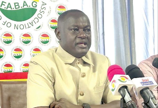 John Awuni, the Executive Chairman of FABAG addressing the media during the event No nuisance taxes in 2024 budget