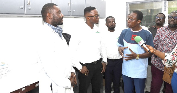 Dr Harry Akoto (right), acting Medical Director of the Korle Bu Teaching Hospital, briefing Emmanuel Teye Kenney ( 2nd from left), CEO of Flokefama, and some officials of the Blood Bank during the handing over ceremony Dr Harry Akoto (right), acting Medical Director of the Korle Bu Teaching Hospital, briefing Emmanuel Teye Kenney ( 2nd from left), CEO of Flokefama, and some officials of the Blood Bank during the handing over ceremony