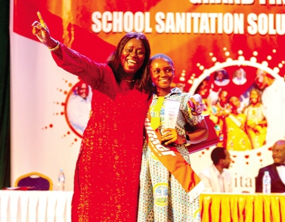 Adokarley Opkoti-Paulo (left), Director of Finance, Zoomlion Ghana Limited, with Adjoa Gyakoa Appiah-Kubi, the winner of the School Sanitation Solution Challenge Adokarley Opkoti-Paulo (left), Director of Finance, Zoomlion Ghana Limited, with Adjoa Gyakoa Appiah-Kubi, the winner of the School Sanitation Solution Challenge