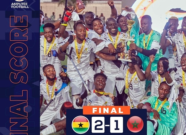 Players of Black Challenge celebrating with the trophy after their victory