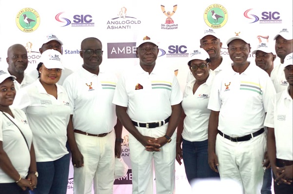 Otumfuo Osei Tutu II (middle) with some golfers Otumfuo Osei Tutu II (middle) with some golfers