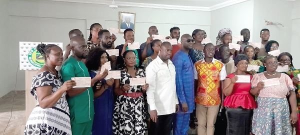 Alhaji Ibrahim Bashiru (middle), Deputy Chief Executive Officer of the Youth Employment Agency, and beneficiaries of the yea programme Alhaji Ibrahim Bashiru (middle), Deputy Chief Executive Officer of the Youth Employment Agency, and beneficiaries of the yea programme