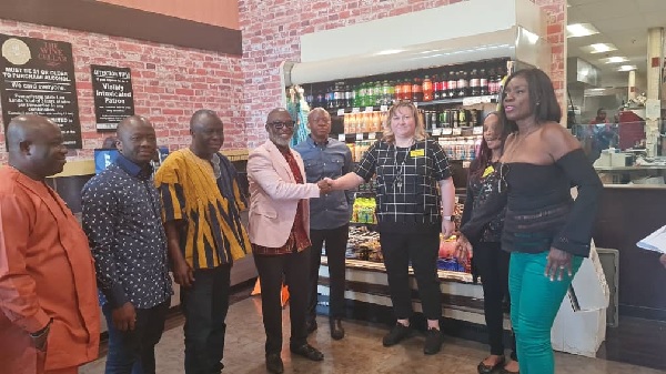 Yofi Grant (4th from left), CEP, GIPC, in a handshake with Deasra Basher, a representative of Brown’s ShopRite after the introductory ceremony. With them are Florence Torson-Hart (right) among other dignitaries from Ghana Five Ghanaian SMEs penetrate US market — Products to sell at ShopRite stores