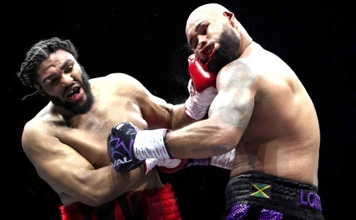 • Jeamie Tshikeva lands a hook to the face of Frazer Clarke during the fight