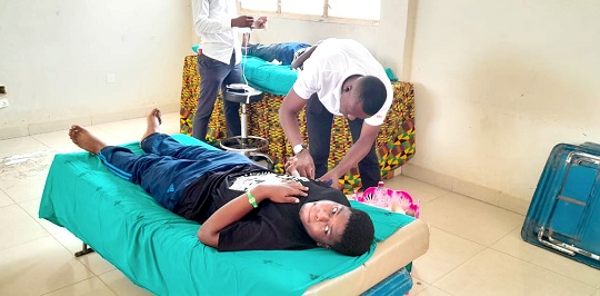 A donor being processed to donate blood A donor being processed to donate blood