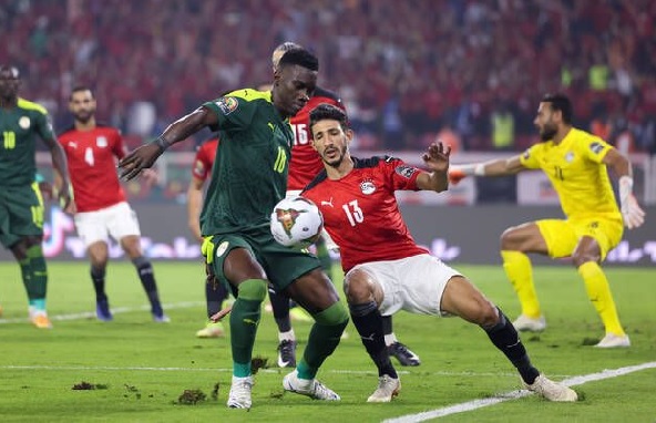 Ismaila Sarr (left) playing in the final of the 2021 AFCON against Egypt Ismaila Sarr (left) playing in the final of the 2021 AFCON against Egypt