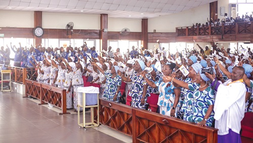 Members of the church rejoicing after the anniversary was launched. Picture: Caleb Vanderpuye  
