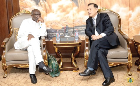 Ken Ofori-Atta (left), Minister of Finance, in a discussion with Lu Kun, the Chinese Ambasador to Ghana, at the meeting in Accra Ken Ofori-Atta (left), Minister of Finance, in a discussion with Lu Kun, the Chinese Ambasador to Ghana, at the meeting in Accra