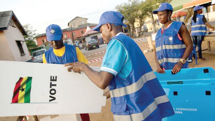 EC officials setting up voting station for election to begin EC officials setting up voting station for election to begin