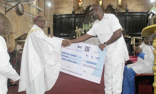 Edwin Provencal (right), Managing Director, BOST, presenting a dummy cheque to Rt. Rev. Dr Daniel Slyavnus Mensah Torto, Bishop of the Anglican Diocese of Accra. Picture: ESTHER ADJORKOR ADJEI Edwin Provencal (right), Managing Director, BOST, presenting a dummy cheque to Rt. Rev. Dr Daniel Slyavnus Mensah Torto, Bishop of the Anglican Diocese of Accra. Picture: ESTHER ADJORKOR ADJEI