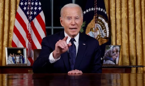 U.S. President Joe Biden delivers a prime-time address to the nation about his approaches to the conflict between Israel and Hamas, humanitarian assistance in Gaza and continued support for Ukraine in their war with Russia, from the Oval Office of the White House in Washington, U.S. October 19, 2023. REUTERS President Joe Biden