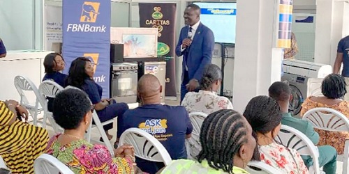 Victor Yaw Asante (with mic), MD of FBNBank, addressing the guests at the draw Victor Yaw Asante (with mic), MD of FBNBank, addressing the guests at the draw