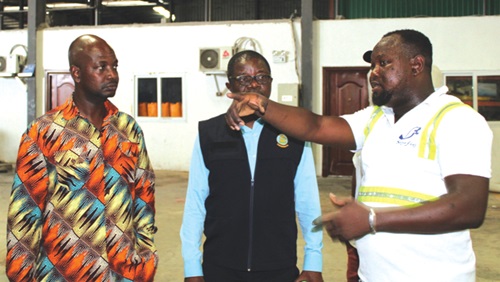 Frank Afari Ankamah (left), Board Chairman of GIDA, and Richard Oppong-Boateng (middle), CEO of GIDA, being briefed by Prince Selassie Tong-Kurug, Health and Safety Supervisor of Shinefeel Ghana Company Limited Frank Afari Ankamah (left), Board Chairman of GIDA, and Richard Oppong-Boateng (middle), CEO of GIDA, being briefed by Prince Selassie Tong-Kurug, Health and Safety Supervisor of Shinefeel Ghana Company Limited