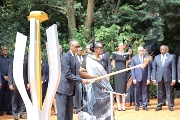 Rwandan President Paul Kagame lighting a memorial flame during a ceremony to mark the 30th anniversary of the Rwandan genocide, held at the Kigali Genocide Memorial, in Kigali Rwanda on Sunday, April 7, 2024