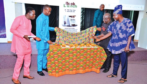 From left to right: Very Rev. Dr Kwesi Addo Jnr., the Master of Ceremonies; Evangelist Peter Ekow Sika Yena Essien, author of the book; Dr Isaac Charles Noble Morrison, a medical practitioner, and Richard Osei Appiah, CEO of Riosap Ltd, unveiling the books From left to right: Very Rev. Dr Kwesi Addo Jnr., the Master of Ceremonies; Evangelist Peter Ekow Sika Yena Essien, author of the book; Dr Isaac Charles Noble Morrison, a medical practitioner, and Richard Osei Appiah, CEO of Riosap Ltd, unveiling the books