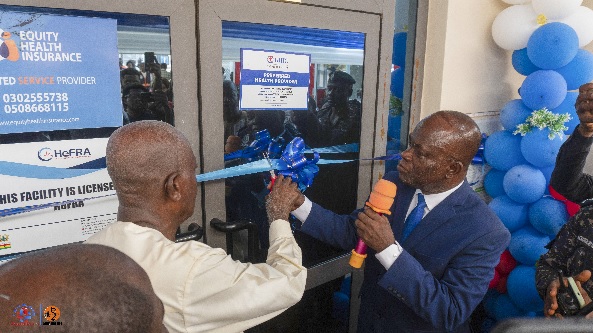 Some of the dignitaries cutting the tape to signify the opening of the hospital