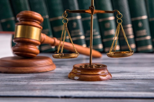Driver, dog breeder before the law for assaulting another over phone